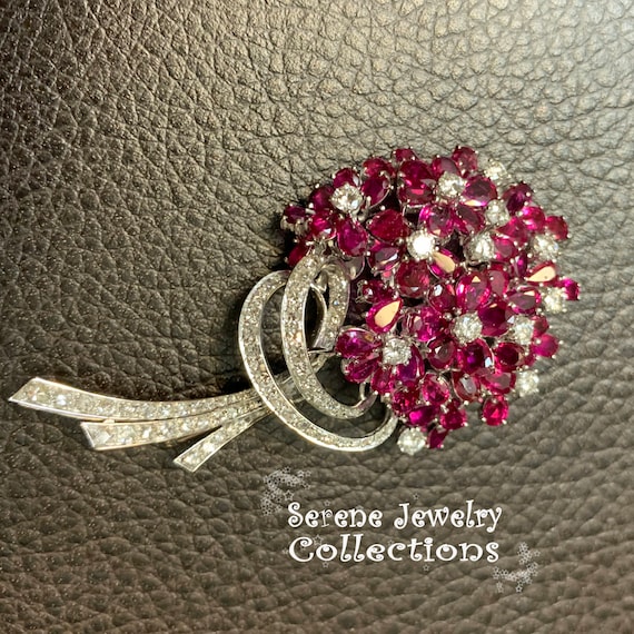 Ruby and diamond brooch deals