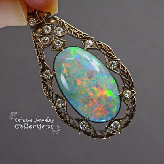 Solid black opal pendant deals