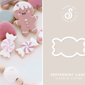 May include: A white peppermint candy cookie cutter with a rounded shape and wavy edges. The cutter is on a light pink background with the text "PEPPERMINT CANDY cookie cutter" below it.