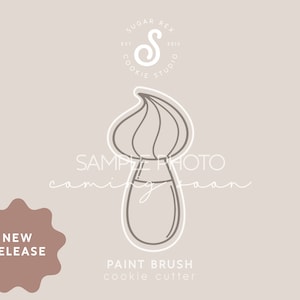 May include: A line drawing of a paint brush cookie cutter. The image is a sample photo and says "New Release" and "Paint Brush cookie cutter".