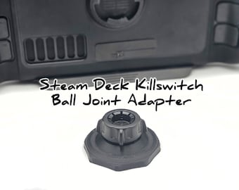 Op de afbeelding: Zwarte plastic kogelgewricht adapter voor een Steam Deck killswitch. De adapter heeft een getextureerd oppervlak en een ronde knop aan de bovenkant.