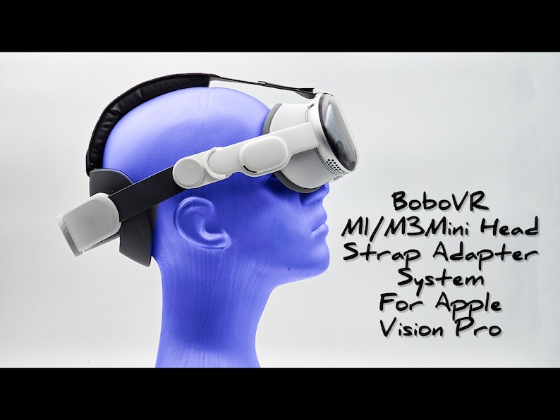 May include: A white and gray virtual reality headset with a black head strap. The headset is being worn by a blue mannequin head. The text "BoboVR M1/M3 Mini Head Strap Adapter System For Apple Vision Pro" is written in black on a white background.