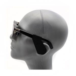 May include: Black sunglasses with a rectangular frame and silver accents. The temples are black and feature a black, padded ear rest for comfort. The sunglasses are displayed on a gray mannequin head against a white background.