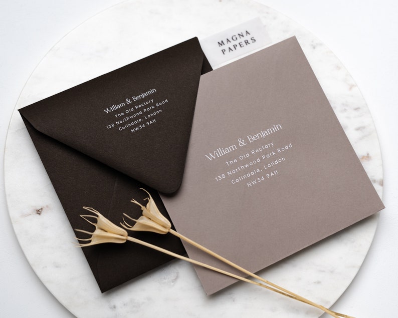 May include: Two envelopes with white text on a brown and a light brown background. The text reads "William & Benjamin The Old Rectory 138 Northwood Park Road Colindale, London NW34 9AH" and "MAGNA PAPERS".