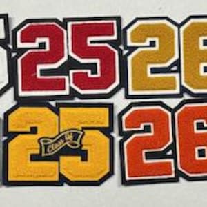 以下が含まれることがあります： さまざまな色とスタイルの数字20、23、25、26が描かれたアイロン接着パッチ12個セット。衣服、バッグ、その他の布製品に個性的なタッチを加えるのに最適です。