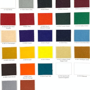 May include: A color chart featuring twenty-seven rectangular felt swatches arranged in a grid. Each swatch is labeled with a specific number and color name, including White, Silver Grey, Black, Maroon, Cardinal Red, Red, Orange, and Green shades.