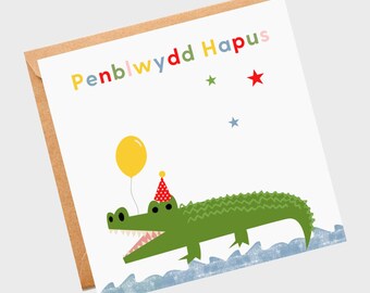 Pen-blwydd hapus. Feliz cumpleaños