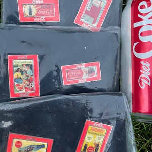 Set of 6,  Coca-Cola Lapel Pins.  Enameled, Metal pins from 1998 Coke Collection.