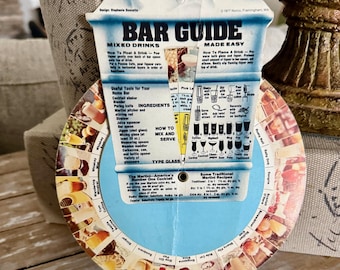 Millésime RARE, guide des bars, avec « Roue » de recettes mobiles de cocktails/boissons mélangées, 1977
