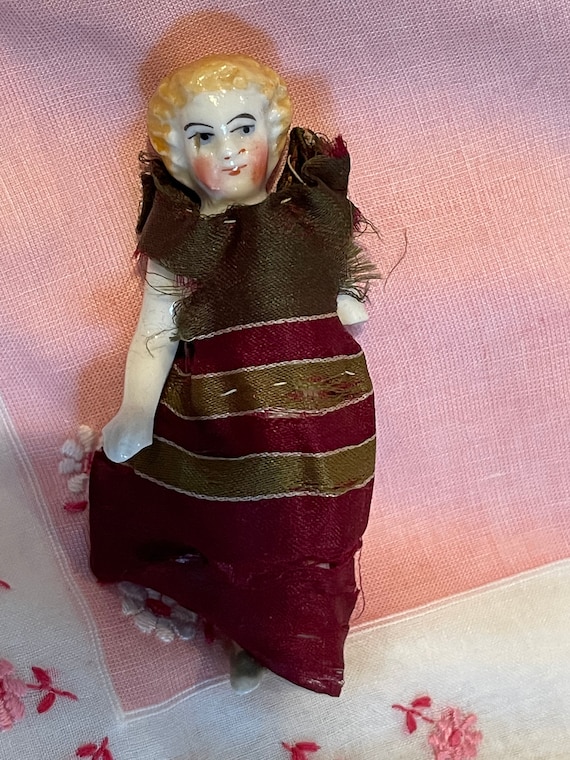 Antique frozen charlotte doll on sale