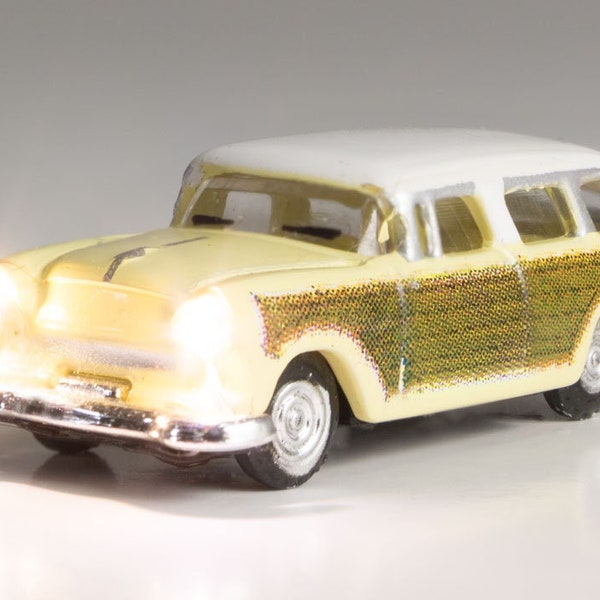 Woodland Scenics 1/160 N Scale Woodie STATION WAGON w/Driver -Included LED headlights, taillights & flashing light -Just Plug(R) Lighted Car