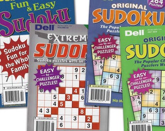 Livros de Sudoku da Penny Press, Sudku e DELL. Quatro livros, com 698 quebra-cabeças no total.