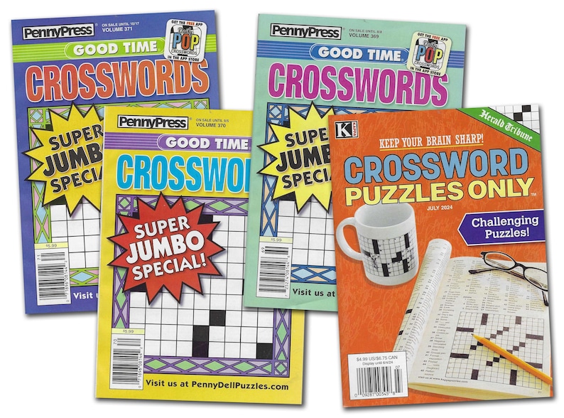 May include: Four crossword puzzle magazines with colorful covers. The magazines feature the words "Good Time Crosswords" and "Super Jumbo Special." One cover shows a mug with a crossword puzzle design.