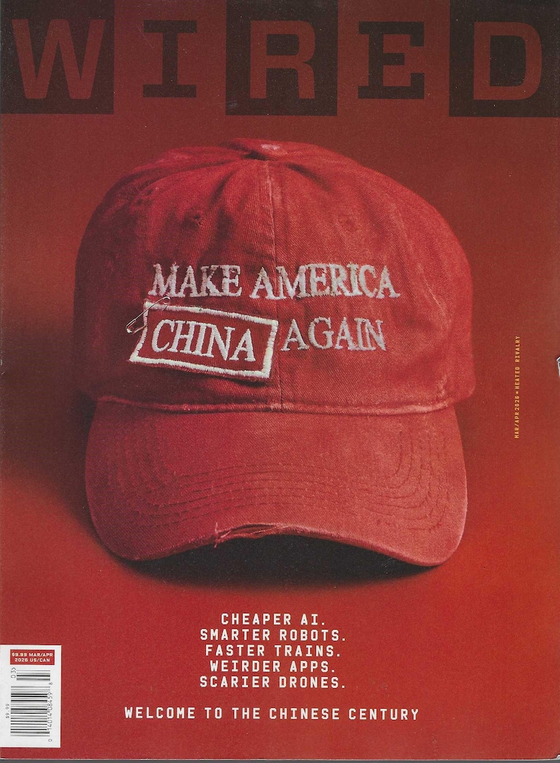 May include: The cover of Wired magazine features a red baseball cap with the text "MAKE AMERICA CHINA AGAIN" in white. The magazine's title, "WIRED," is at the top. The background is a solid red color, with additional text at the bottom.