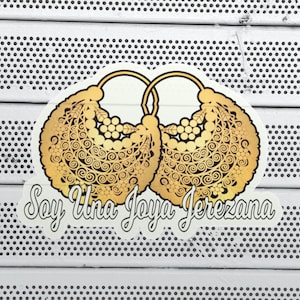 May include: A sticker with a gold design of two ornate earrings and the text "Soy Una Joya Jerezana".