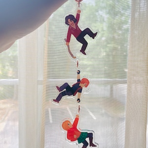 Leon, Ashley, and Luis 6 inch double sided linking charm