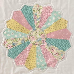 May include: A set of three ceramic mugs with a speckled, matte finish. The mugs are in shades of cream, light gray, and dark gray. Each mug has a simple, modern design and a rounded handle. Perfect for coffee or tea.