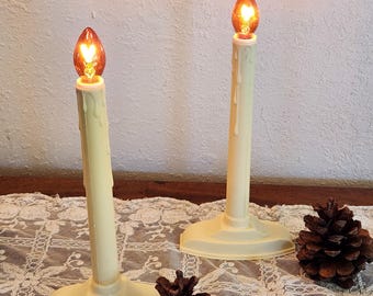 Lot de deux bougeoirs électriques MCM de Noël vintage avec ampoules NOMA FANTASTIC