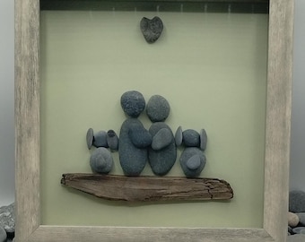 Retrato familiar en arte de guijarros: arte en piedra de playa de Nueva Inglaterra