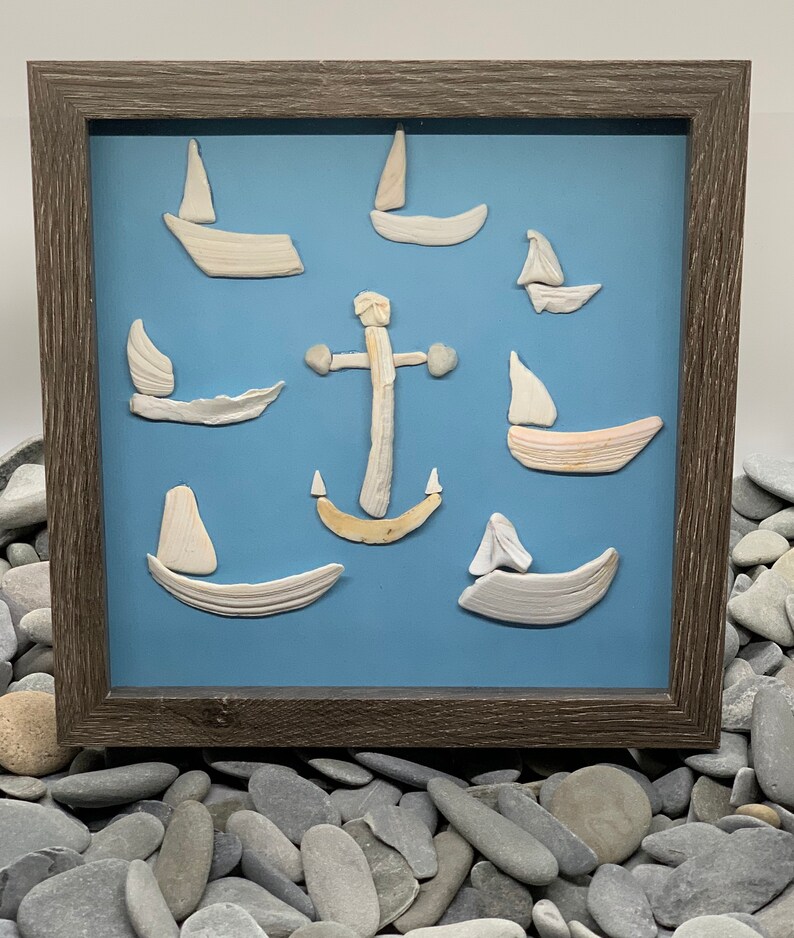 sailboat pebble art