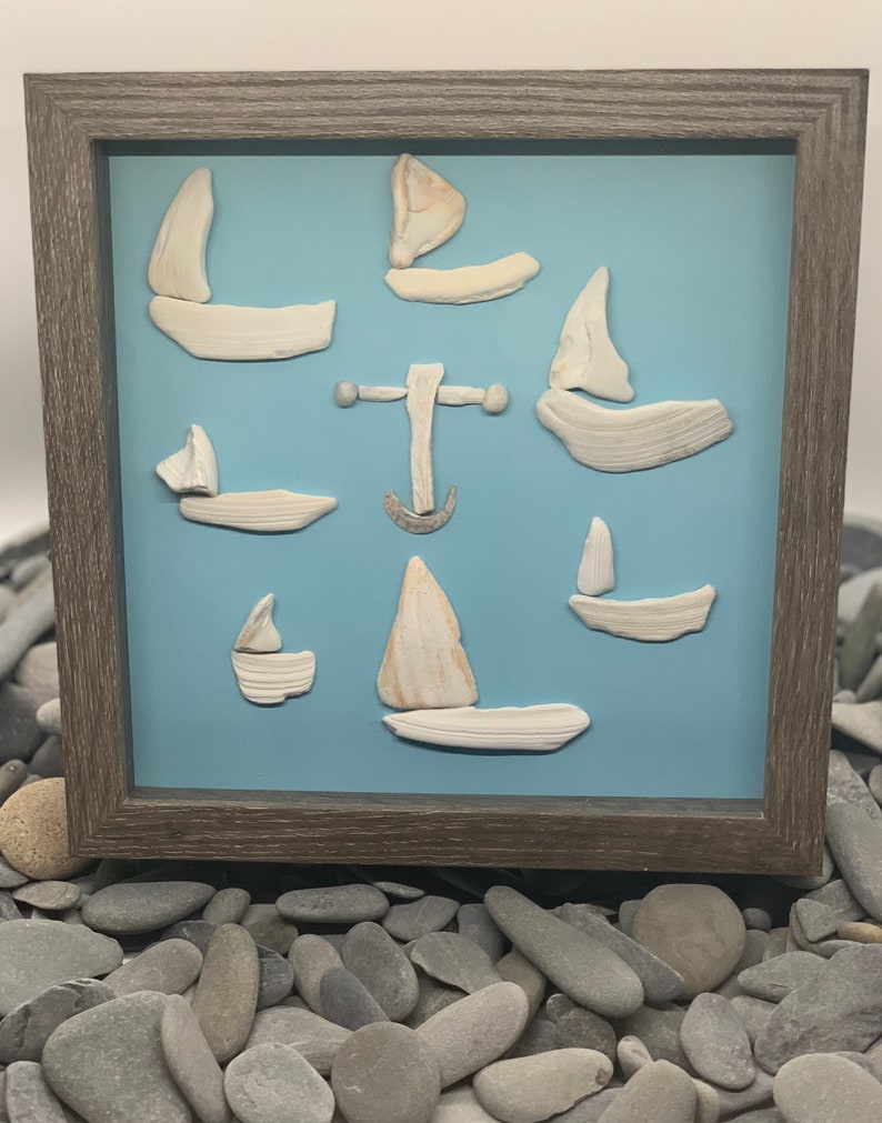 sailboat pebble art