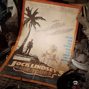 May include: Vintage travel poster advertising Jock Lindsey's Air Tours. The poster features a plane flying over palm trees and the text "Travel on the Wings of Adventure". The poster also lists destinations including Americas, Nepal, Cairo, Shanghai, Venice, Paris, Austria, Jordan, and more.