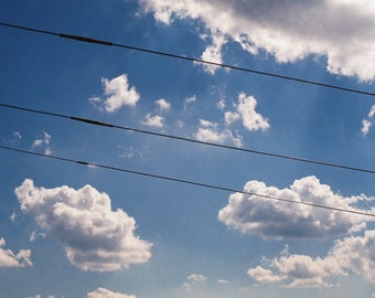 Wolken boven Minneapolis (Minnesota) - Muurkunstfotoafdruk - 35 mm filmfoto