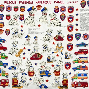 May include: A white fabric panel with an applique design featuring Dalmatian puppies dressed as firefighters, police officers, and EMTs. The panel also includes various vehicle and badge designs, including fire trucks, police cars, and ambulances. The text "RESCUE FRIENDS APPLIQUE PANEL by VIP" is printed at the top of the panel.