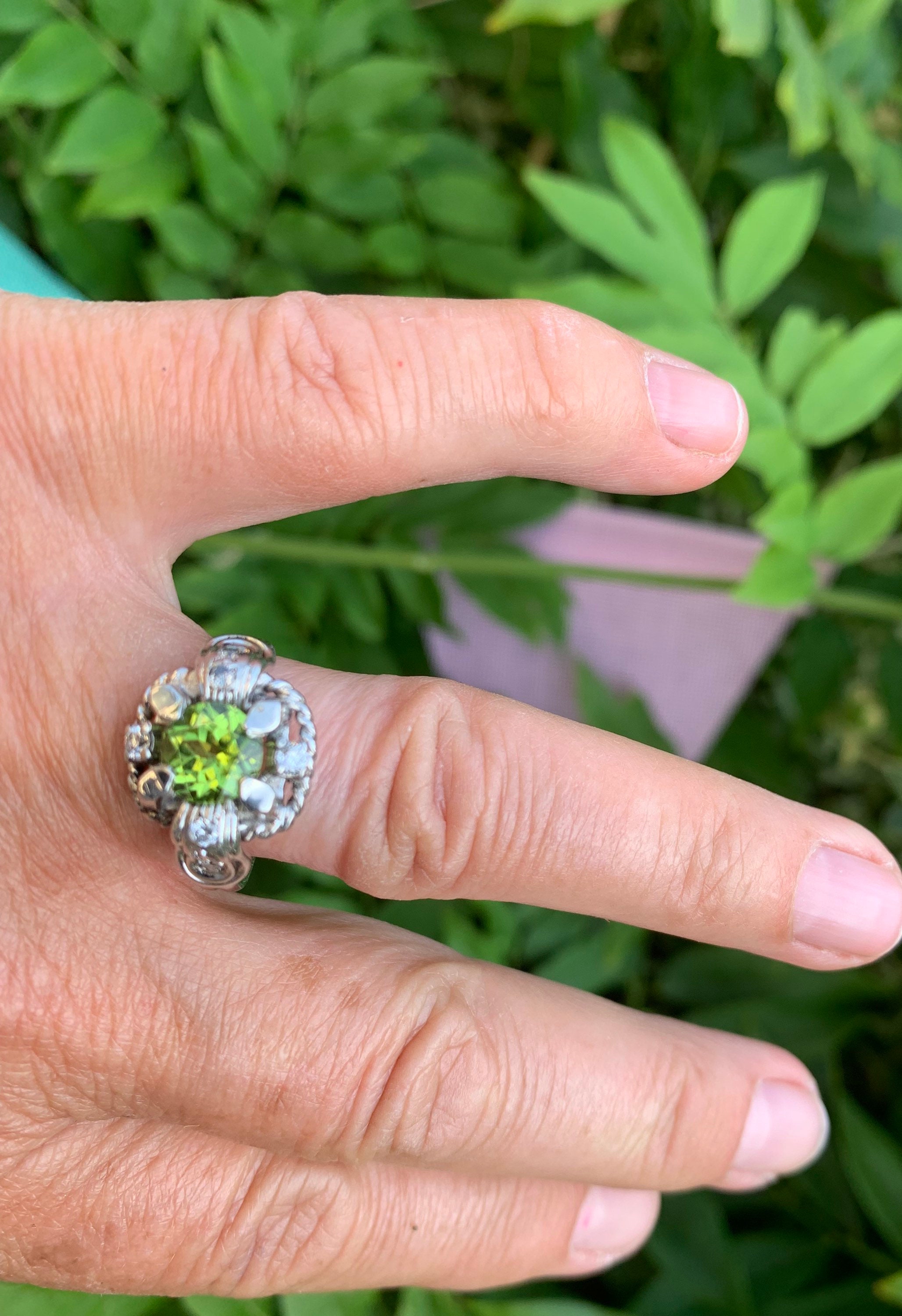 Peridot platinum deals ring