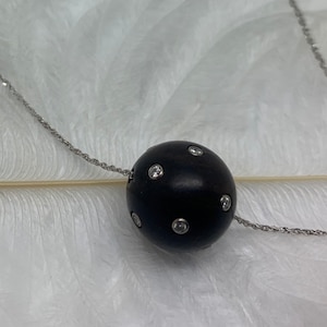 Unusual Vintage Diamond set Wood Ball with chain. 18 ct gold.rub over set diamonds.