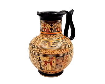 May include: A brown and black ceramic Greek amphora with a geometric design and a scene of a person riding a horse. The amphora has a black handle and a black rim.