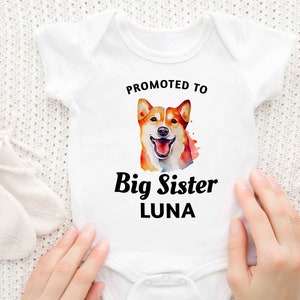 a baby bodysuit with a picture of a dog on it