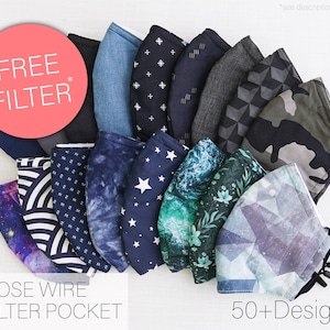 Op de afbeelding: Een collectie stoffen mondkapjes met diverse patronen zoals sterren, camouflage, bloemen en geometrische prints. De maskers zijn voorzien van een neusbeugel en filtervak. De tekst op de afbeelding luidt FREE FILTER, NOSE WIRE, FILTER POCKET, 50+Designs.