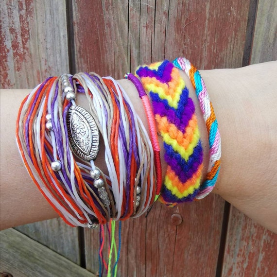Set of 12 Handcrafted Friendship Bracelets in Colorful Hues - Bohemian  Adventures | NOVICA