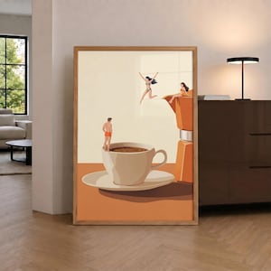 May include: A framed wall art print featuring a surreal illustration of a large coffee cup and a moka pot. Tiny figures in swimwear are depicted jumping into and sitting on the edge of the coffee cup and the moka pot, set against a cream background.
