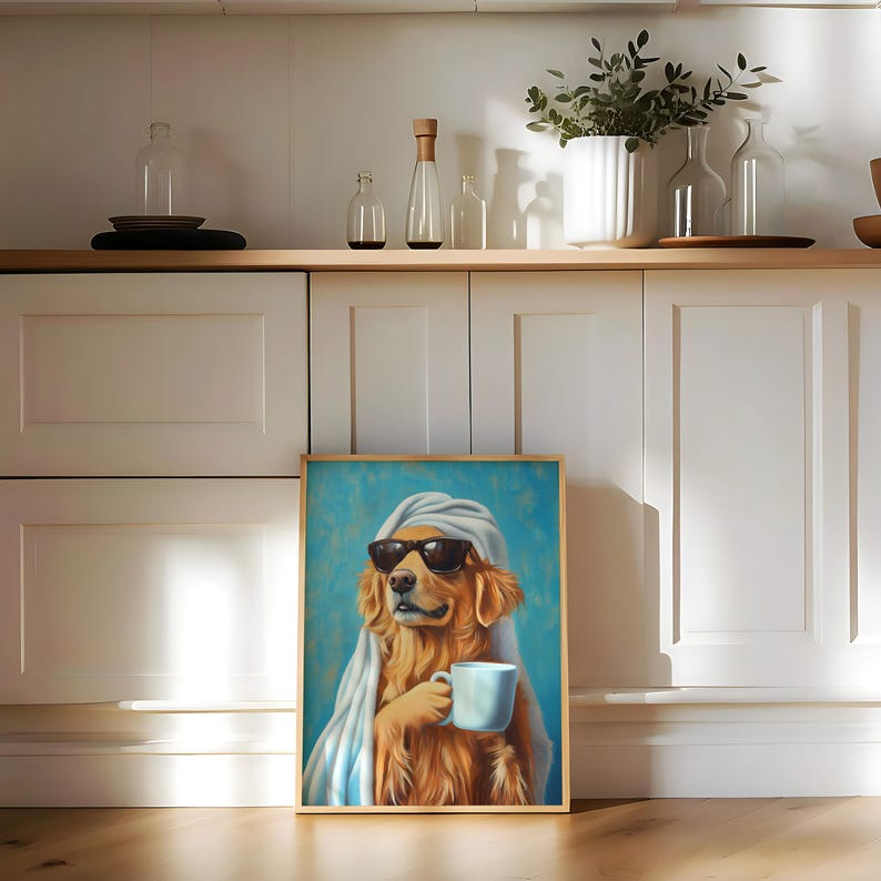 May include: A framed painting of a golden retriever wearing sunglasses and a towel, holding a blue mug. The dog is looking at the viewer with a relaxed expression. The background is a light blue colour.