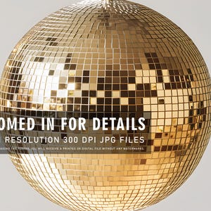 May include: A gold disco ball with a mirrored surface. The ball is made up of many small squares. The image is zoomed in to show the details of the ball.