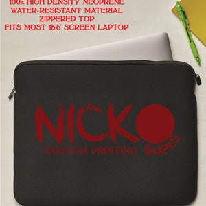 May include: Black neoprene 15-inch laptop sleeve with a red logo and text. Features a zippered top and is made of water-resistant material. Fits most 15.6-inch screen laptops. The text on the sleeve reads "NICKO CUSTOM PRINTING SHAPES".