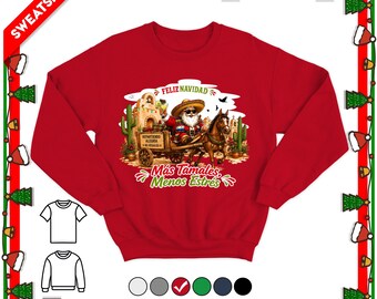 May include: A red long-sleeve sweatshirt featuring a graphic of Santa Claus in a sombrero riding a horse-drawn cart with cacti and a building. The text reads FELIZ NAVIDAD, REPARTIENDO ALEGRIA NO REGALOS, and MÁS TAMALES, MENOS ESTRÉS.