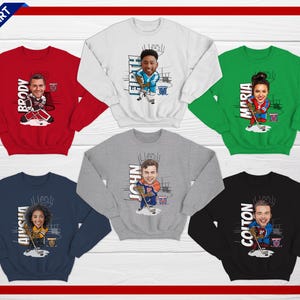 May include: Set of ten colorful sweatshirts with cartoon hockey players and their names. The sweatshirts are in red, white, green, gray, and black.