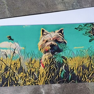May include: A white dog with a fluffy coat stands in a field of tall grass. The grass is a mix of yellow and green, and the sky is a bright blue. The dog is looking directly at the camera.