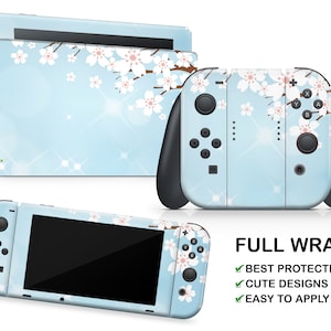 May include: A full wrap skin for the Nintendo Switch console and Joy-Con controllers. The design features a light blue background with white cherry blossoms and sparkling accents. The text "FULL WRAP" is displayed in black at the bottom of the image. The text "BEST PROTECTION", "CUTE DESIGNS", and "EASY TO APPLY" are displayed in green with check marks.