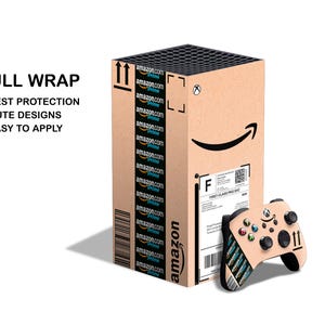 May include: A brown cardboard box with the Amazon logo and text printed on the side. The box is wrapped with a full-colour design of the Amazon logo and text. A black and white video game controller with a similar design is next to the box.