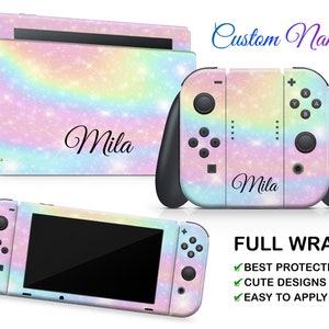 May include: A full wrap skin for a Nintendo Switch console and controllers. The skin features a rainbow glitter design with the name "Mila" printed on it. The skin is advertised as providing full protection, cute designs, and being easy to apply.