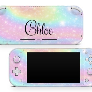 May include: A pink, blue and yellow iridescent Nintendo Switch Lite console skin with a sparkly glitter effect and the name "Chloe" written in black cursive.