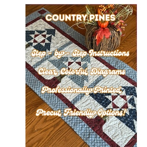 May include: A quilted table runner featuring a repeating star pattern in navy blue, white, and burgundy fabric. Text on the image reads: COUNTRY PINES, Step-by-Step Instructions, Clear Colorful Diagrams, Professionally Printed, Precut Friendly Options!