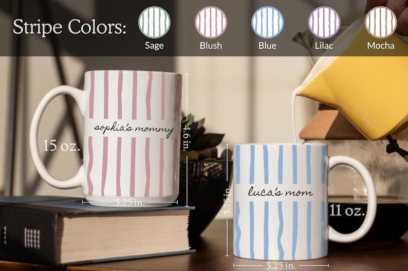 May include: Two white ceramic mugs with vertical stripes in blush and blue. The larger 15 oz. mug is 4.6 inches tall and 3.25 inches wide, labeled 'sophia's mommy'. The 11 oz. mug is 3.75 inches tall and 3.25 inches wide, labeled 'luca's mom'.