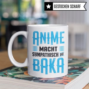 May include: White ceramic mug with a blue design that says "Anime Macht Sympathisch Du Baka".