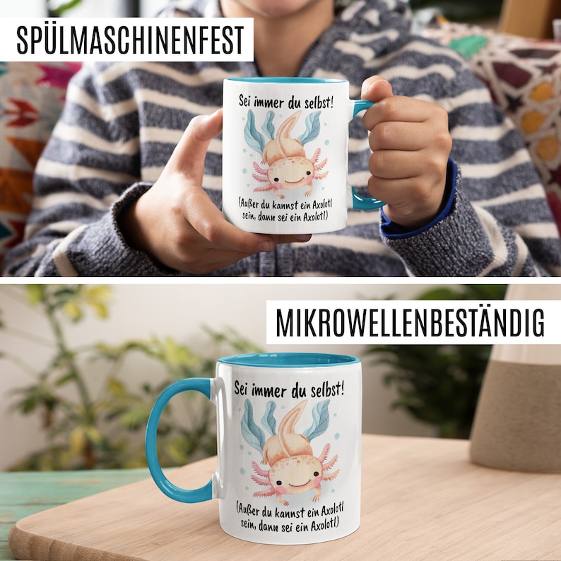 May include: A white ceramic mug with a blue rim and handle. The mug features a cartoon axolotl with the text "Sei immer du selbst! (Au&szlig;er du kannst ein Axolotl sein, dann sei ein Axolotl!)"