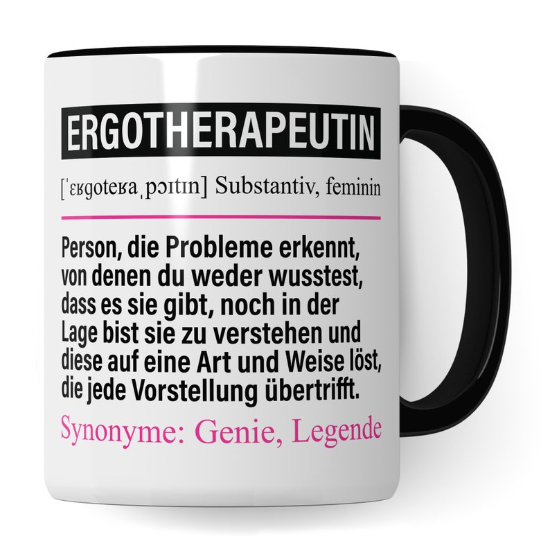 May include: White ceramic mug with a black handle and rim. The mug features a black and white graphic with the text "ERGOTHERAPEUTIN" and a definition of the word in German. The text "Synonyme: Genie, Legende" is also included.